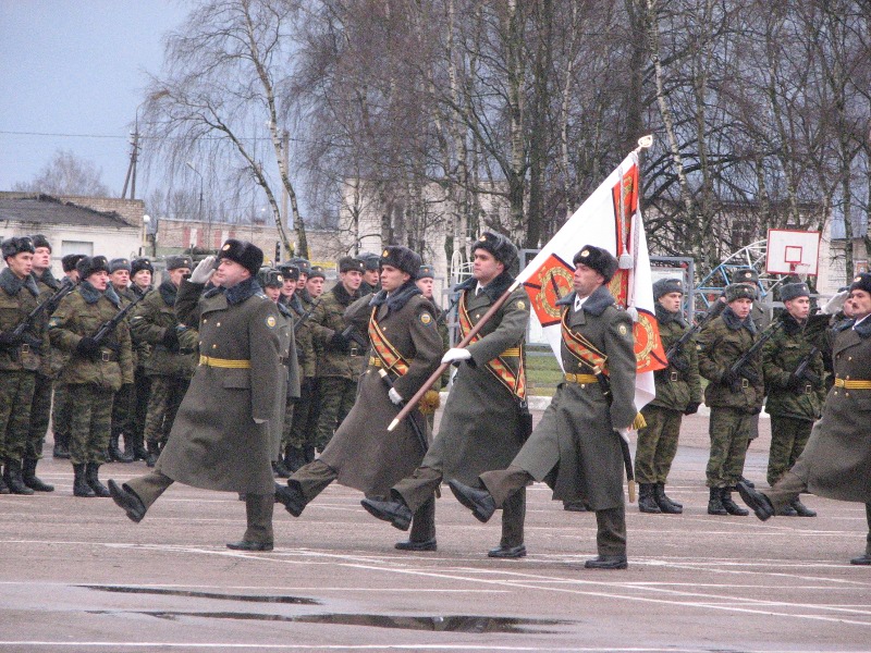 На фото: марш с новыми боевыми знамёнами.